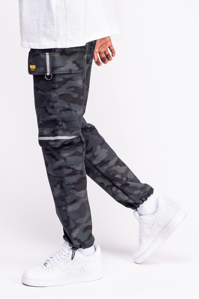DAN ダン Snow Camo Trousers - Black DAN ダン Snow Camo Trousers - Black Snow Camo Trousers